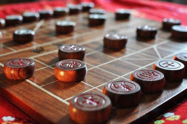中国象棋什么时起源的是谁发明的棋子.